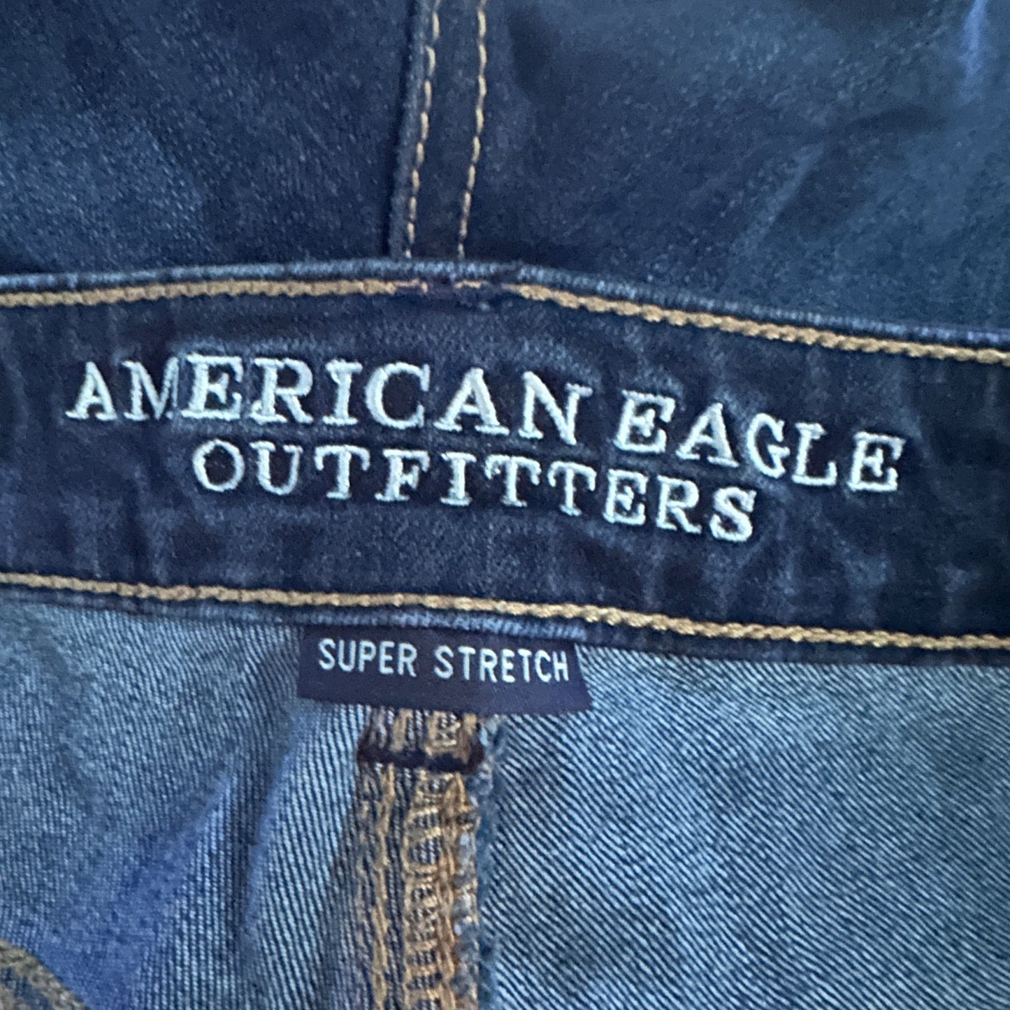 AEO Mid Rise Super Stretch Dark Indigo Cutoff Jean Shorts